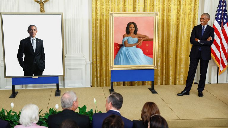 Barack Obama with portraits