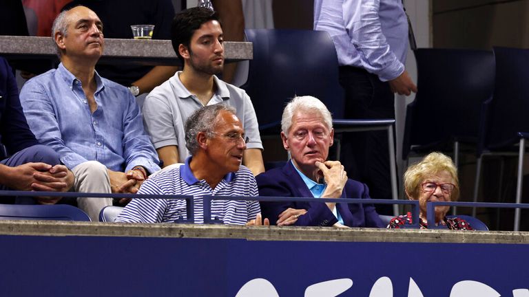 Former President Bill Clinton watches Williams on 29 August. Pic: AP