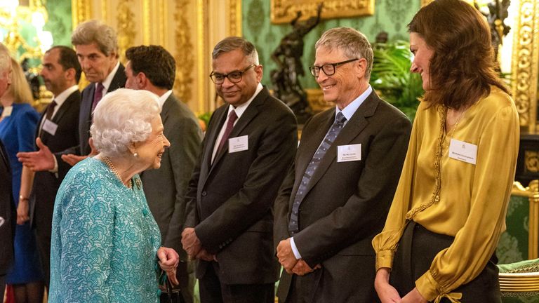 Queen Elizabeth II greets Bill Gates at a reception for international business and investment leaders at Windsor Castle to mark the Global Investment Summit.  Date photo: Tuesday, October 19, 2021. PA Photo.  See PA story ROYAL Investment.  Photo credit must read: Arthur Edwards/The Sun/PA ​​Wire