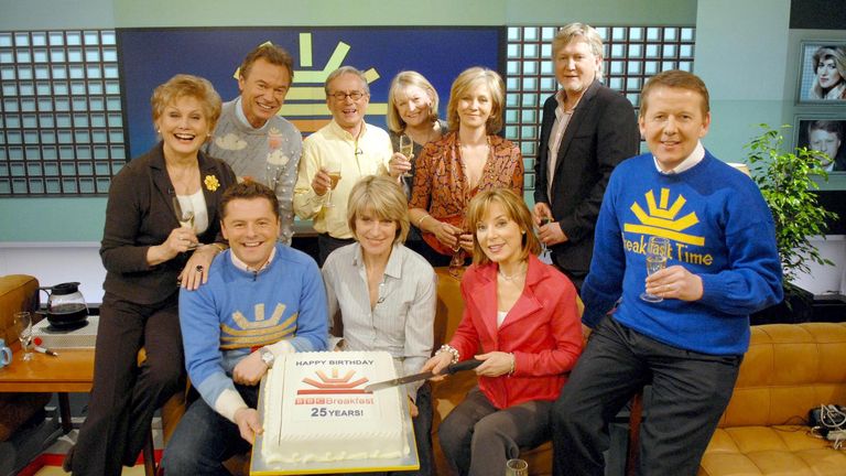 Undated BBC handout photo of BBC Breakfast presenters past and present celebrating the programme&#39;s 25th Anniversary, including (Left to Right) Angela Rippon, Francis Wilson, Chris Hollins, Glyn Christian, Selena Scott, Sue Cook, Sian Williams, Mike Smith and Bill Turnbull.
 