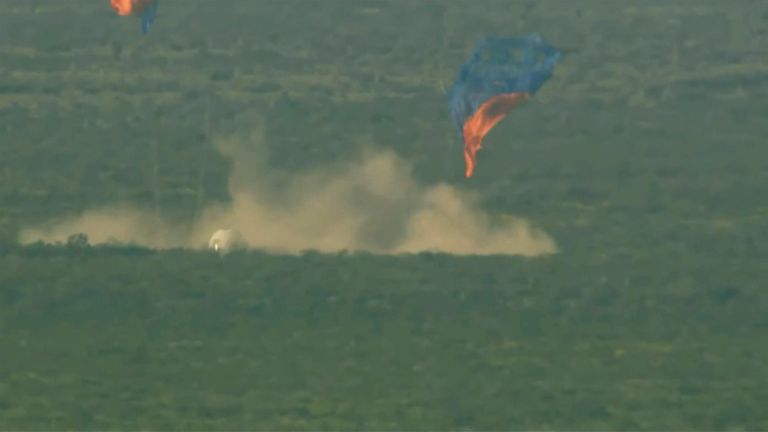 This image provided by Blue Origin shows a capsule containing science experiments after a launch failure and parachuting onto the desert floor on Monday, Sept. 12, 2022. Jeff Bezos&#39; rocket company has suffered its first launch failure. No one was aboard, only science experiments. The Blue Origin rocket veered off course over West Texas about 1 1/2 minutes after liftoff Monday. (Blue Origin via AP)
AP