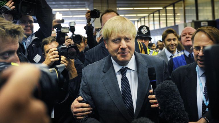 London Mayor Boris Johnson arrives at Birmingham New Street Station before attending the 2012 conference