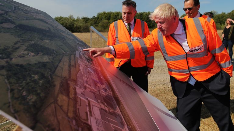 Prime Minister Boris Johnson (right) looks at plans for the Sizewell C nuclear power station project, during his visit to EDF&#39;s Sizewell B Nuclear power station in Suffolk. Picture date: Thursday September 1, 2022.
