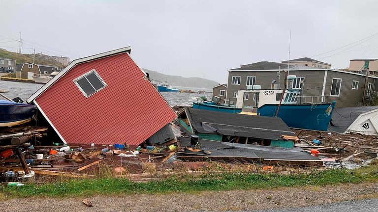 This photo provided by Pauline Billard shows destruction caused by Hurricane Fiona in Rose Blanche, 45 kilometers (28 miles)  east of Port aux Basques, Newfoundland and Labrador, Saturday, Sept. 24, 2022. (Pauline Billard via AP)