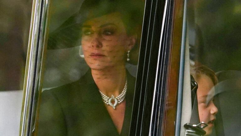 Catherine, Princess of Wales and Prince George of Wales are driven to Westminster Abbey for the funeral of her mother, Queen Elizabeth II, in central London Monday Sept. 19, 2022. The Queen, who died aged 96 on Sept. 8, will be buried at Windsor alongside her late husband, Prince Philip, who died last year. (AP Photo/Alberto Pezzali)