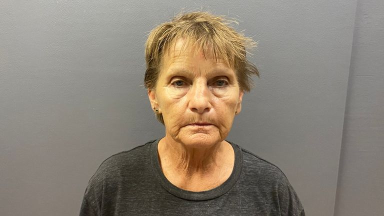Christine Lee Walters, charged with two counts of burglary after Arizona police found her in a house. They also found a mummified body in the bath. Pic: Bullhead City Police department