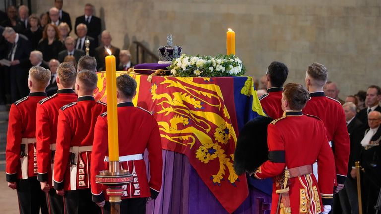 The coffin of Queen Elizabeth arrives at Westminster Hall in London, Wednesday, Sept. 14, 2022. The Queen will lie in state in Westminster Hall for four full days before her funeral on Monday Sept. 19. (AP Photo/Gregorio Borgia, Pool)