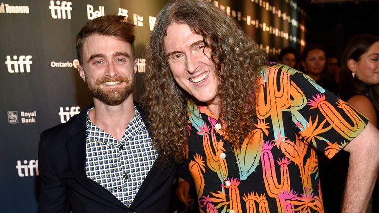 Daniel Radcliffe, left, and "Weird Al" Yankovic pose at the premiere for "Weird: The Al Yankovic Story" on Day 1 of the Toronto International Film Festival at Royal Alexandra Theatre on Thursday, Sept. 8, 2022, in Toronto. (Photo by Evan Agostini/Invision/AP)