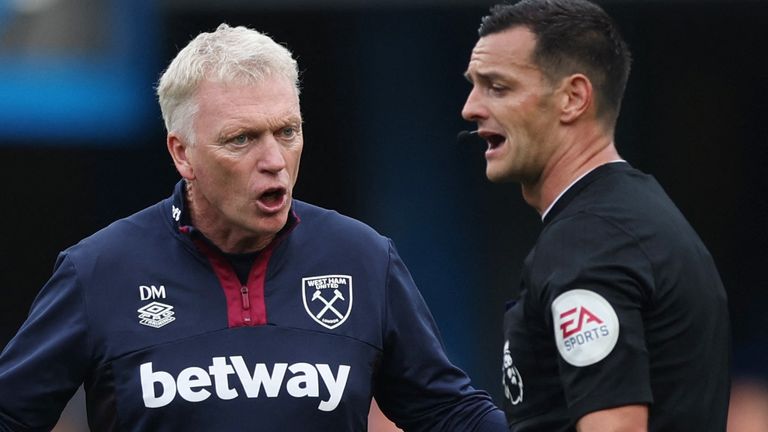Hammers manager pictured talking to referee Andrew Madley after his team&#39;s defeat against Chelsea Pic: REUTERS 
