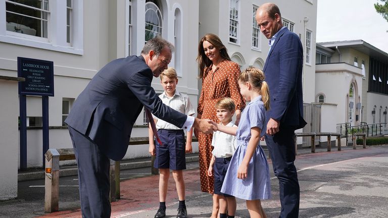 EMBARGOED TO 2230 BST WEDNESDAY SEPTEMBER 7 Prince George, Princess Charlotte and Prince Louis, accompanied by their parents the Duke and Duchess of Cambridge, are greeted by Headmaster Jonathan Perry as they arrive for a settling in afternoon at Lambrook School, near Ascot in Berkshire.  