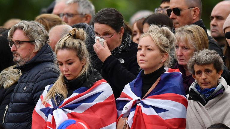 LONDON, ENGLAND - SEPTEMBER 19: Mourners at Westminster Abbey for the State Funeral of Queen Elizabeth II on September 19, 2022 in London, England. Elizabeth Alexandra Mary Windsor was born in Bruton Street, Mayfair, London on 21 April 1926. She married Prince Philip in 1947 and ascended the throne of the United Kingdom and Commonwealth on 6 February 1952 after the death of her Father, King George VI. Queen Elizabeth II died at Balmoral Castle in Scotland on September 8, 2022, and is succeeded b