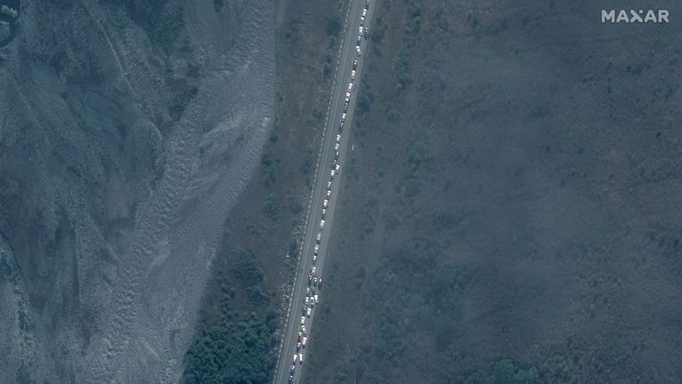Satellite image shows the large traffic jam of trucks and cars waiting to cross the border into satellite images (collected on September 25th)  showing the large traffic jam of trucks and cars waiting to cross the border into Georgia at the Lars checkpoint at the Lars checkpoint on 25 September (Pic: Maxar Technologies)