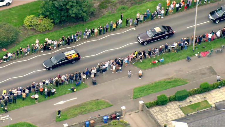  The hearse carrying the coffin of Britain&#39;s Queen Elizabeth passes near Dundee