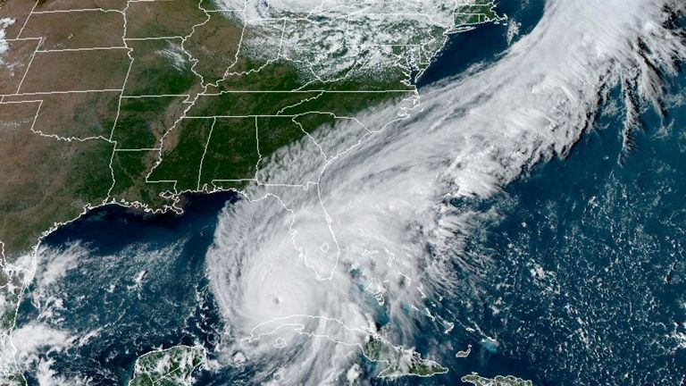 Satellite image taken at 4:26 p.m. EDT Tuesday, Sept. 27, 2022, showing Hurricane Ian over the Gulf of Mexico (NOAA via AP)