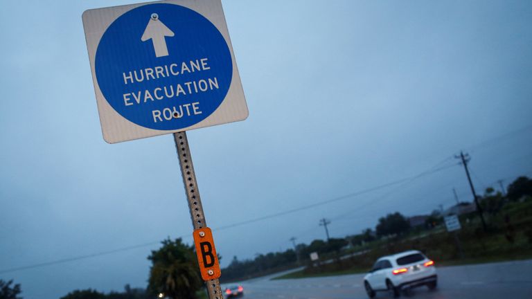 Ferocious Hurricane Ian tears across Florida ripping up trees and flooding homes