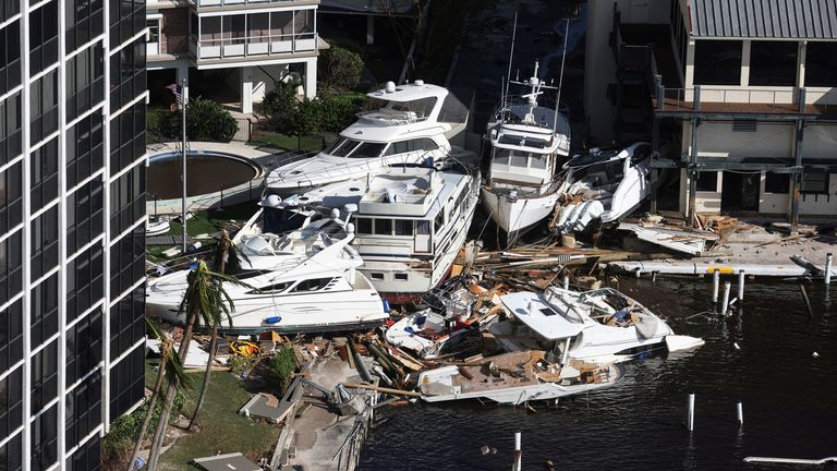 An aerial view of boats crashed in a harbor after Hurricane Ian caused widespread destruction in Fort Myers Beach, Florida, U.S., September 29, 2022. REUTERS/Shannon Stapleton