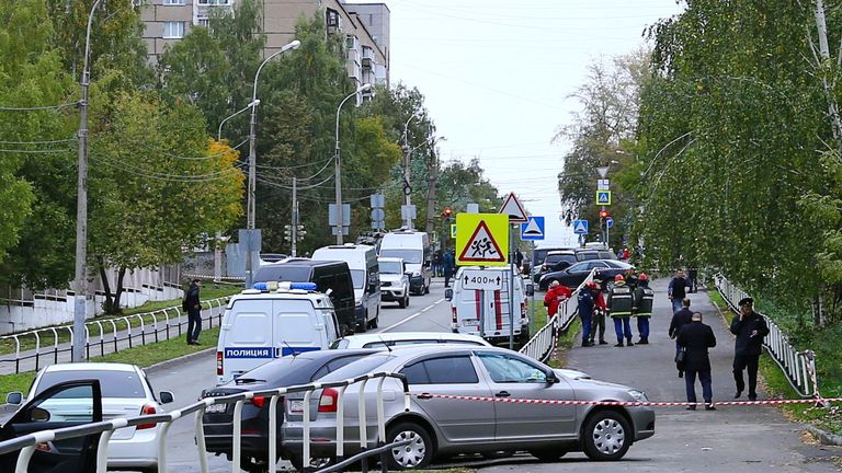 Police and members of emergency services work near the scene of a school shooting in Izhevsk, Russia September 26, 2022. REUTERS/Stringer
