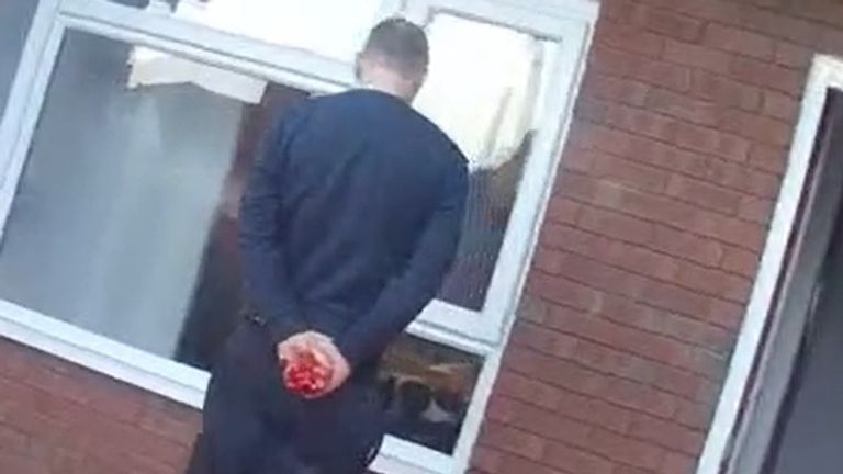 Crosbie&#39;s blood-soaked hands can be seen in the footage. Pic: Norfolk Police