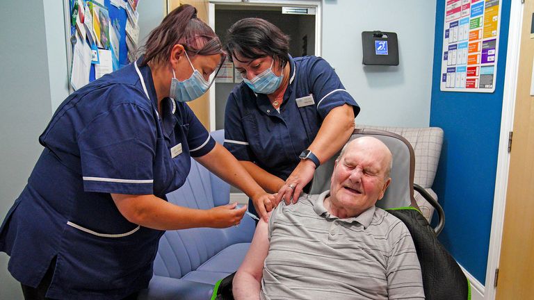 Care home resident Jeff Collins receiving his autumn Covid booster vaccination at Gorsey Clough Nursing Home, Tottington, Bury. The Covid-19 booster vaccine programme is under way in England and Scotland. Although infections are falling, health experts are predicting a resurgence of coronavirus this winter amid a possible worse flu season. Picture date: Thursday September 8, 2022.