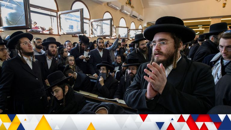 Ultra-Orthodox Jewish pilgrims pray at the tomb of Rabbi Nachman of Breslov