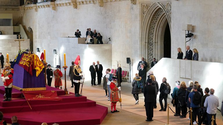 US President Joe Biden and First Lady Jill Biden (far right) view the coffin of Queen Elizabeth II, lying in state on the catafalque in Westminster Hall, at the Palace of Westminster, London. Picture date: Sunday September 18, 2022. Joe Giddens/Pool via REUTERS

