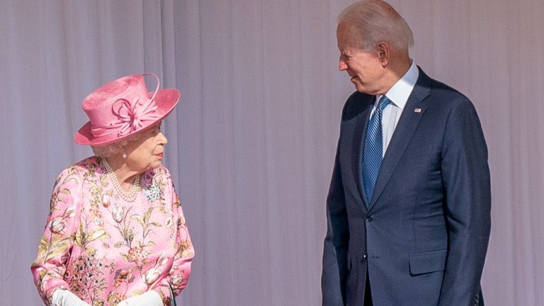 U.S.President Joe Biden stands next to Britain's Queen Elizabeth as they meet at Windsor Castle, in Windsor, Britain, June 13, 2021. Arthur Edwards/Pool via REUTERS