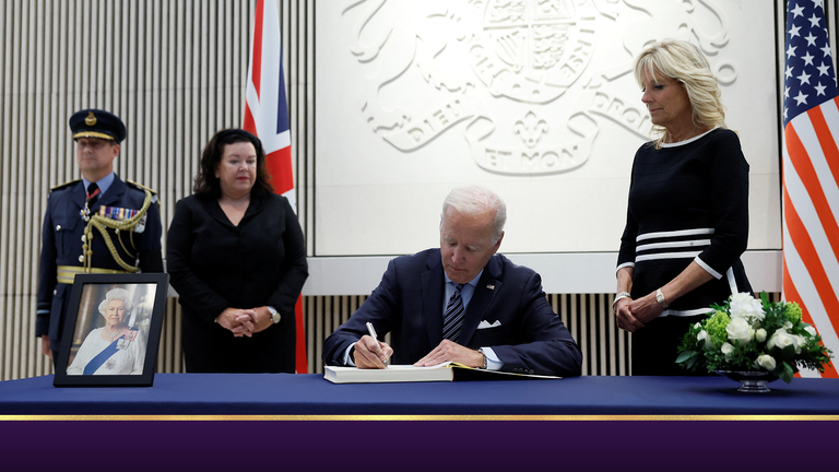 U.S. President Joe Biden signs a condolence book as U.S. first lady Jill Biden looks on after Queen Elizabeth, Britain&#39;s longest-reigning monarch and the nation&#39;s figurehead for seven decades, died aged 96, at the British Embassy, in Washington, U.S., September 8, 2022. REUTERS/Evelyn Hockstein