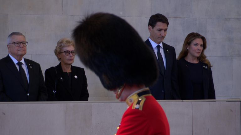 Canadian Prime Minister Justin Trudeau and his wife Sophie look at the Queen lying in state at Westminster Hall