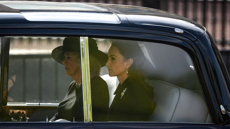 The Queen Consort, the Princess of Wales, the Duchess of Sussex and the Countess of Wessex are making their way towards the Palace of Westminster.
