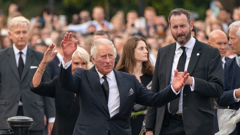 King Charles III and the Queen wave to the crowd outside Buckingham Palace, London after travelling from Balmoral following the death of Queen Elizabeth II on Thursday. Picture date: Friday September 9, 2022