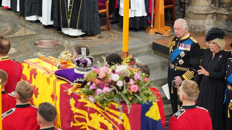 King Charles III and the Queen Consort in front of the coffin of Queen Elizabeth II during her State Funeral at the Abbey in London. Picture date: Monday September 19, 2022.
