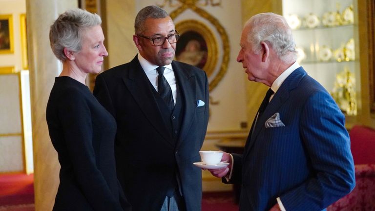 King Charles III speaking to Foreign Secretary James Cleverly during a reception with Realm High Commissioners and their spouses in the Bow Room at Buckingham Palace, London. Picture date: Sunday September 11, 2022.
