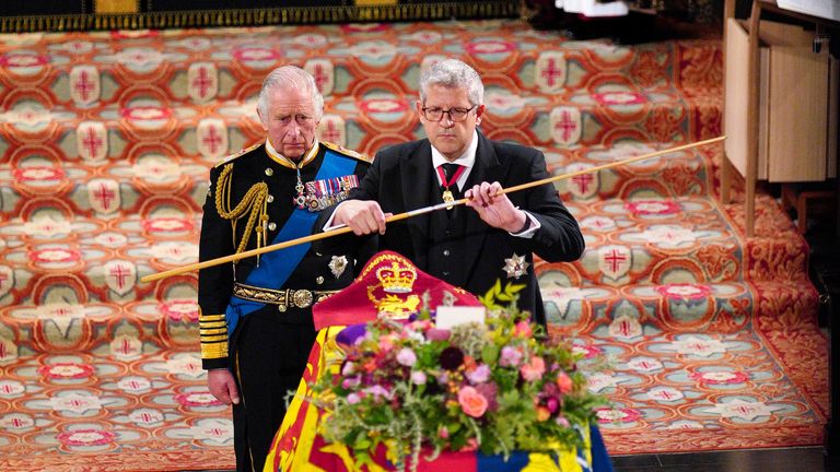 royal monogram :King Charles III watches as the Lord Chamberlain breaks his Wand of Office at the Committal Service for Queen Elizabeth II held at St George's Chapel in Windsor Castle, Berkshire. Picture date: Monday September 19, 2022.