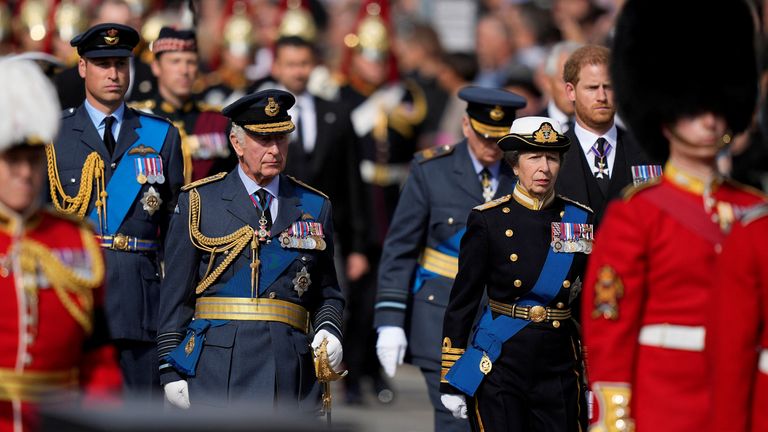 King Charles, Princess Anne, Prince William and Prince Harry walk behind the Queen&#39;s coffin