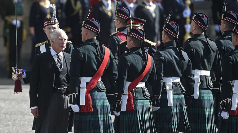 King Charles III inspects the guard of honour at the Ceremony of the Keys at the Palace of Holyroodhouse, Edinburgh. Picture date: Monday September 12, 2022.