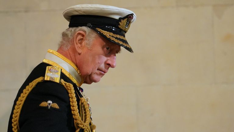 King Charles III arrives to stand vigil beside the coffin of his mother, Queen Elizabeth II, as it lies in state on the catafalque in Westminster Hall, at the Palace of Westminster, London. Picture date: Friday September 16, 2022.