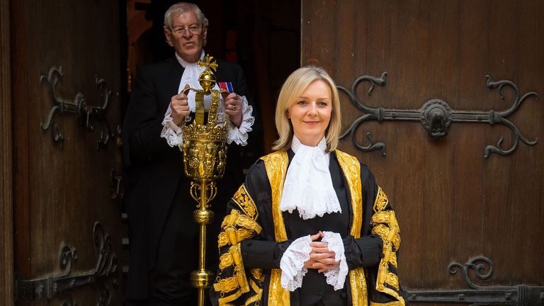 The new Lord Chancellor Liz Truss, who is the first woman ever to hold the role, poses for photographers at the Judge&#39;s entrance to the Royal Courts of Justice, in central London. PRESS ASSOCIATION Photo. Picture date: Thursday July 21, 2016. Photo credit should read: Dominic Lipinski/PA Wire