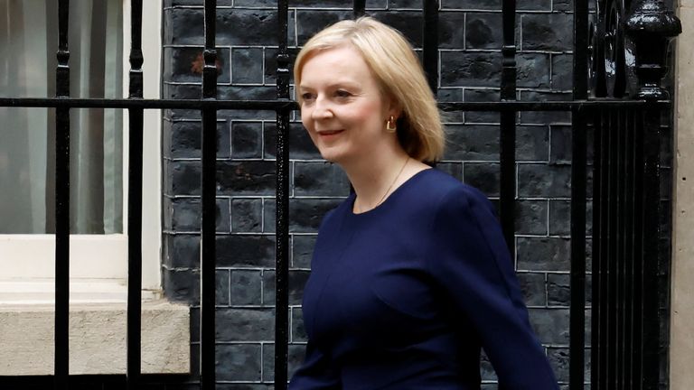  Prime Minister Liz Truss walks outside Downing Street in London