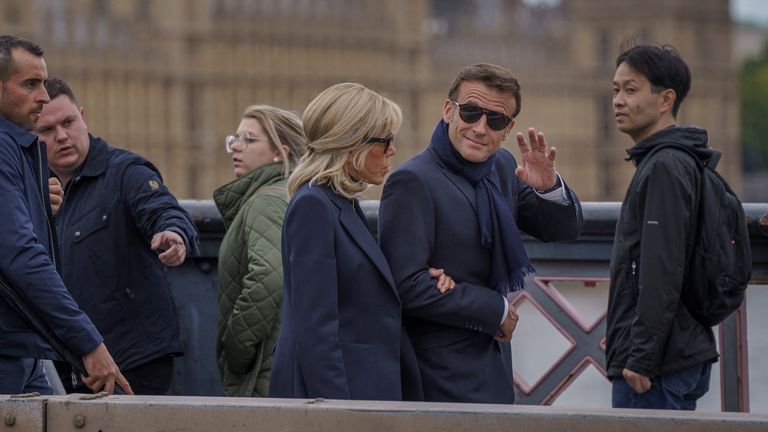 French President Emmanuel Macron and his wife Brigitte Macron walk the day before Queen Elizabeth&#39;s funeral in Westminster Abbey, London, Britain September 18, 2022. Heiko Junge/NTB/via REUTERS ATTENTION EDITORS - THIS IMAGE WAS PROVIDED BY A THIRD PARTY. NORWAY OUT. NO COMMERCIAL OR EDITORIAL SALES IN NORWAY.