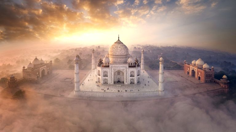Siena Awards: Drone Photo Awards 2022. URBAN: Commended - A Love Tale in the Mist - Taj Mahal by Michele Falzone This is the mausoleum of the Taj Mahal on an incredible sea of ​​clouds over the Yamuna River.  The Eternal Monument to Love was built in 1632 to honor Mumtaz Mahal, the wife of Moghul Shāh Jahān, who died giving birth to their 14th child.