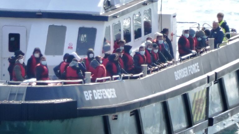 A group of people thought to be migrants are brought in to Dover, Kent, onboard a Border Force vessel following a small boat incident in the Channel. Picture date: Tuesday September 20, 2022.
