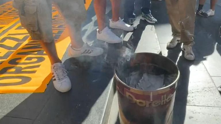 Unemployed people burn their bills in Naples
