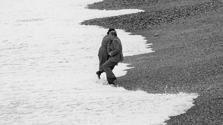 Neil Kinnock and his wife on Brighton beach - shortly before he fell into the waves