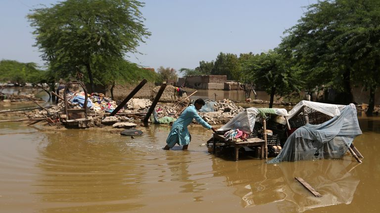 A man looks for salvageable belongings from his flooded home in the Shikarpur district of Sindh Province, Pakistan, Thursday, Sept. 1, 2022. Pakistani health officials on Thursday reported an outbreak of waterborne diseases in areas hit by recent record-breaking flooding, as authorities stepped up efforts to ensure the provision of clean drinking water to hundreds of thousands of people who lost their homes in the disaster. 
PIC:AP