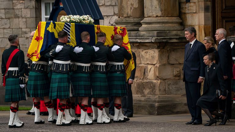 The Princess Royal curtsied as she watched the Queen&#39;s coffin being carried into the Palace of Holyroodhouse. Pic: AP