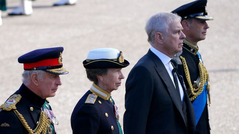 Britain&#39;s King Charles, Princess Anne, Princess Royal, Prince Andrew, Duke of York and Prince Edward, Earl of Wessex walk behind Queen Elizabeth&#39;s coffin during the procession from the Palace of Holyroodhouse to St Giles&#39; Cathedral, Edinburgh, Scotland, Britain September 12, 2022. Peter Byrne/Pool via REUTERS