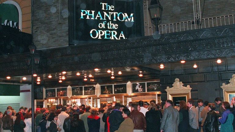 Theatergoers stand outside the entrance of the Majestic Theater in 1988