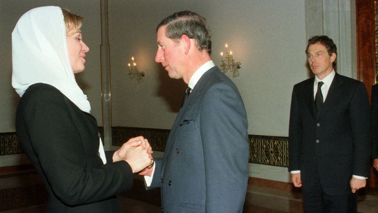 Britain&#39;s Prince Charles pays his condolences to American-born Queen Noor, widow of Jordan&#39;s King Hussein, while British Prime Minister Tony Blair (R) looks on at an Amman royal palace after the funeral of his late husband February 8. King Hussein was laid to rest by a nation steeped in grief and by a galaxy of world leaders who came to pay homage to a pivotal figure in the quest for Middle East peace. ES/WS
