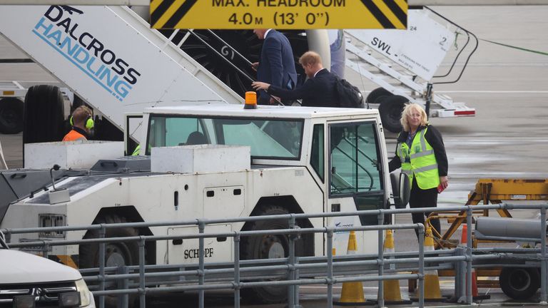 Britain&#39;s Prince Harry board a plane at Aberdeen International Airport, following the passing of Britain&#39;s Queen Elizabeth, in Aberdeen, Britain, September 9, 2022. REUTERS/Phil Noble

