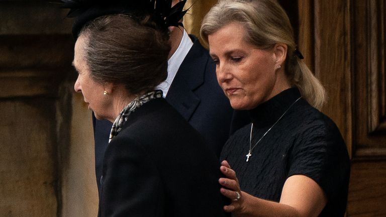 The Princess Royal is comforted by the Countess of Wessex as the coffin of Queen Elizabeth II, draped with the Royal Standard of Scotland, completes its journey from Balmoral to the Palace of Holyroodhouse in Edinburgh, where it will lie in rest for a day. Picture date: Sunday September 11, 2022.
